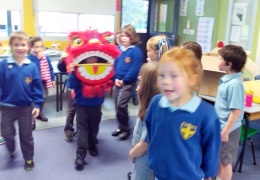 Grade 1 students learning about the Lion Dance with Tj