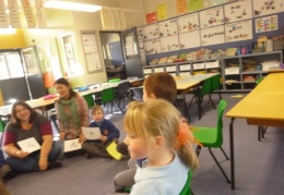 Grade 1 students in class with TJ